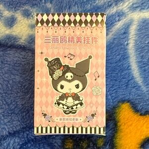 Kuromi with Hello Kitty keychain